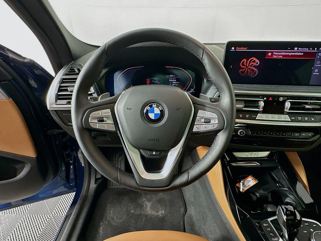 used 2025 BMW X4 car, priced at $49,499