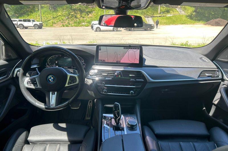 used 2023 BMW 530e car, priced at $39,299
