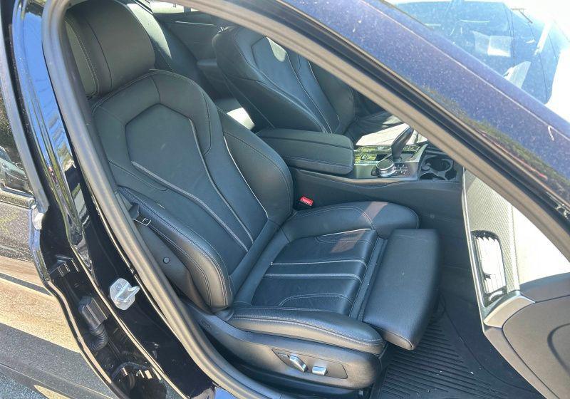 used 2023 BMW 530e car, priced at $39,299
