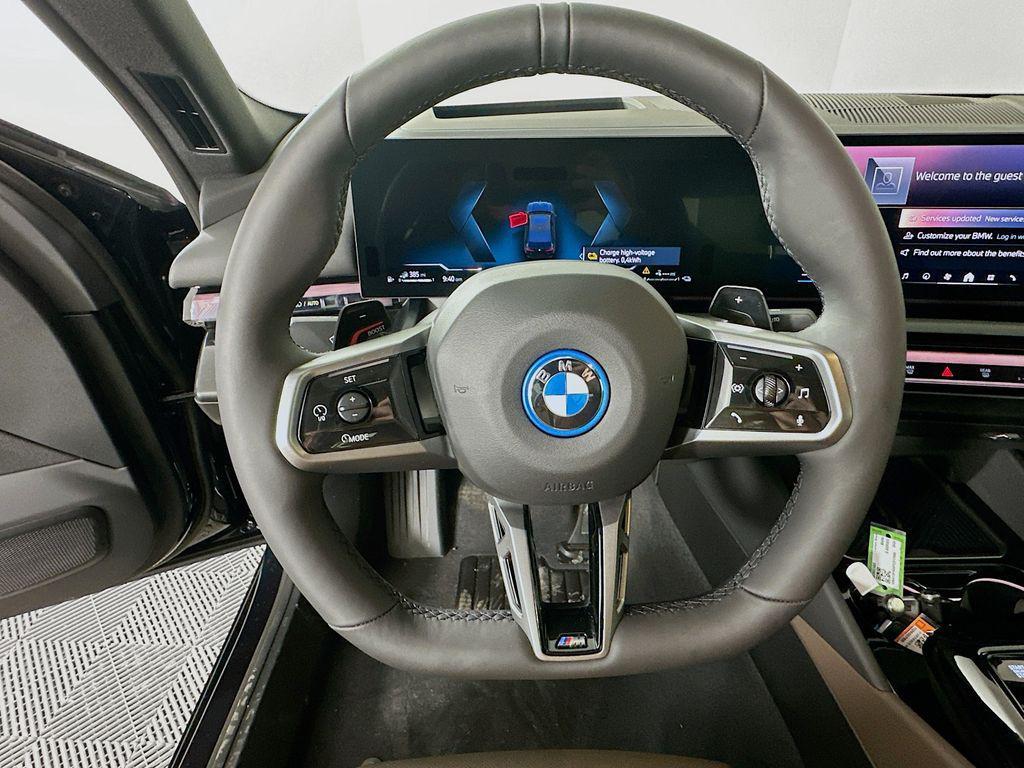 new 2026 BMW 550e car, priced at $87,565