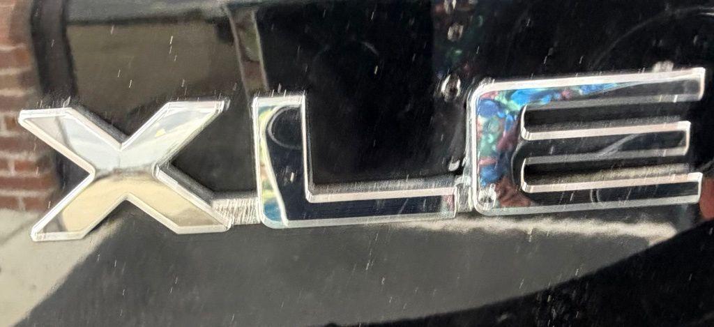 used 2022 Toyota Highlander Hybrid car, priced at $34,800