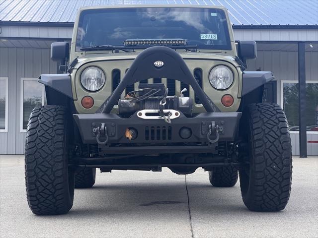 used 2013 Jeep Wrangler Unlimited car, priced at $13,700