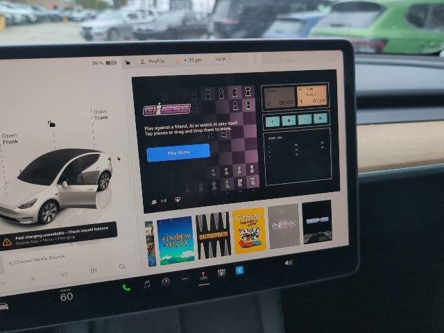 used 2023 Tesla Model Y car, priced at $28,000