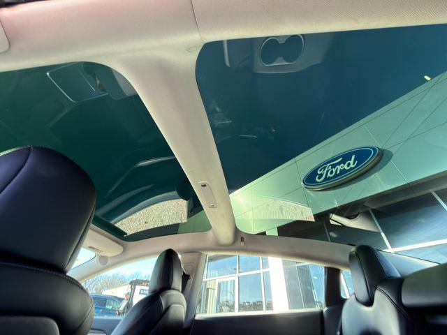 used 2022 Tesla Model 3 car, priced at $17,999