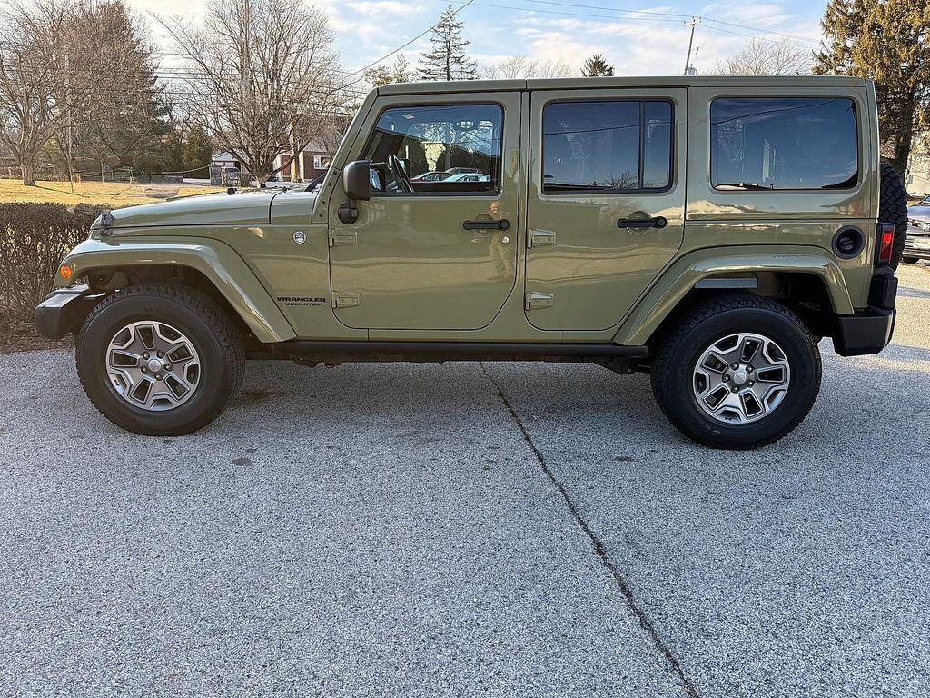 used 2013 Jeep Wrangler Unlimited car, priced at $21,552