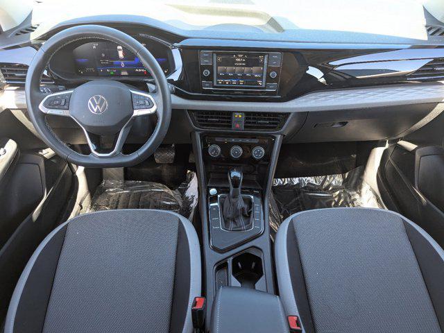used 2023 Volkswagen Taos car, priced at $18,595