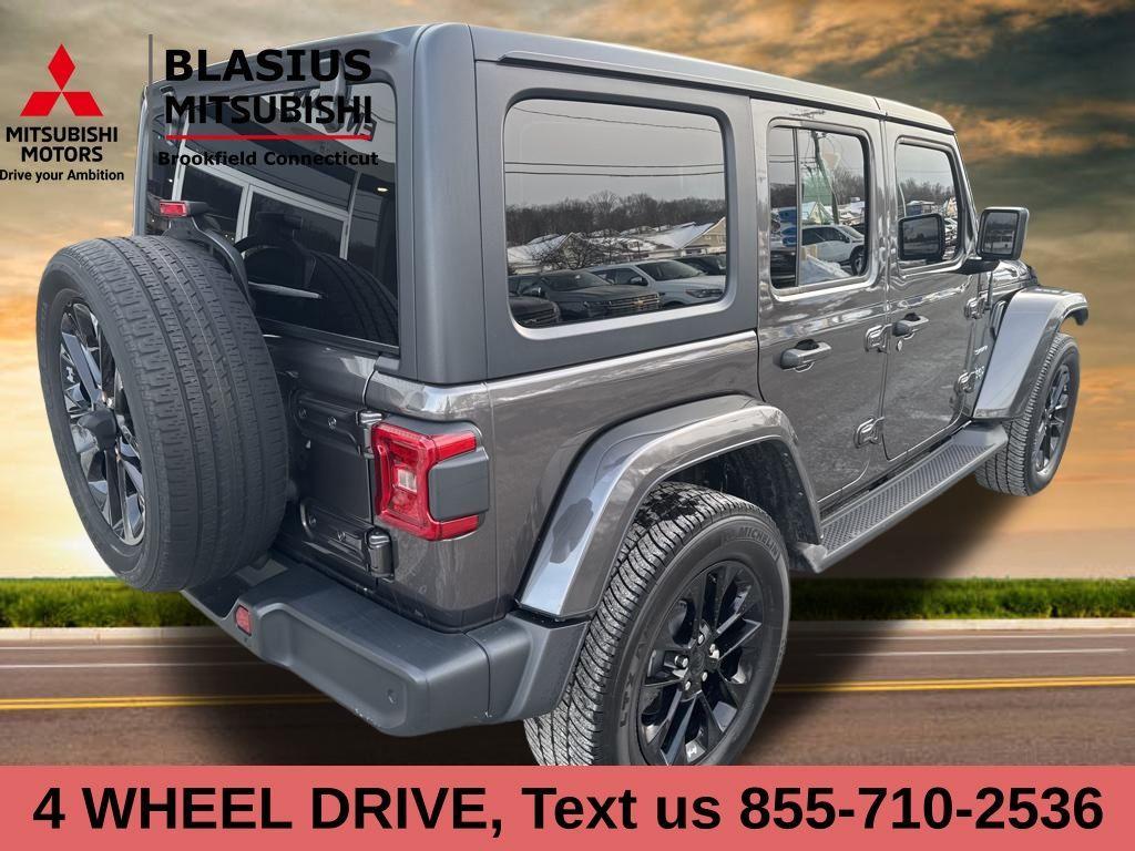 used 2021 Jeep Wrangler Unlimited 4xe car, priced at $23,304