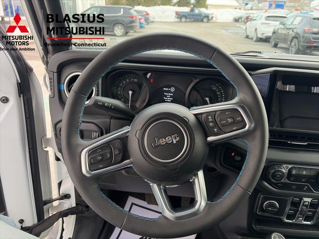 used 2024 Jeep Wrangler 4xe car, priced at $37,657