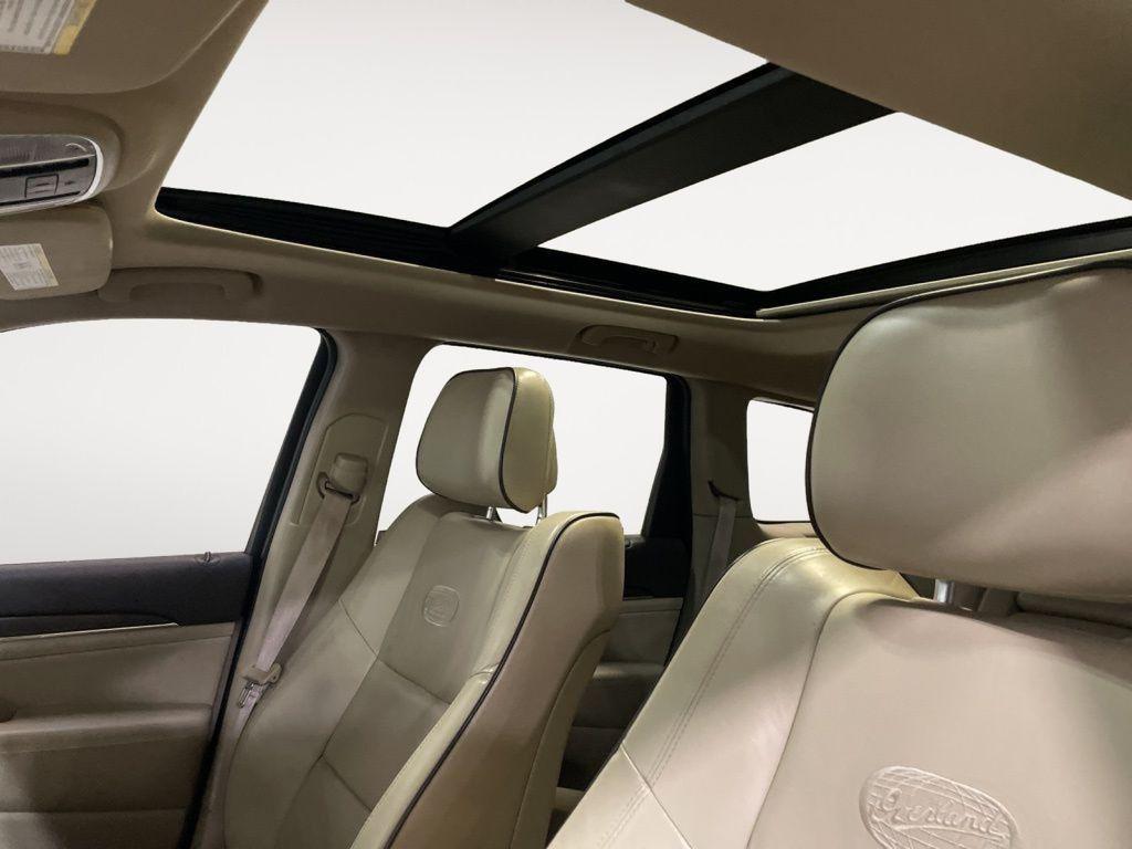 used 2014 Jeep Grand Cherokee car, priced at $11,879