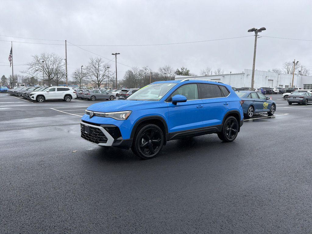 used 2025 Volkswagen Taos car, priced at $33,995