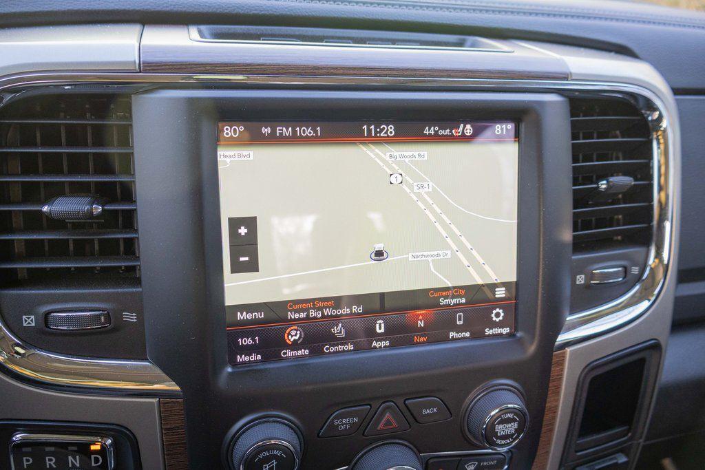 used 2018 Ram 1500 car, priced at $25,597