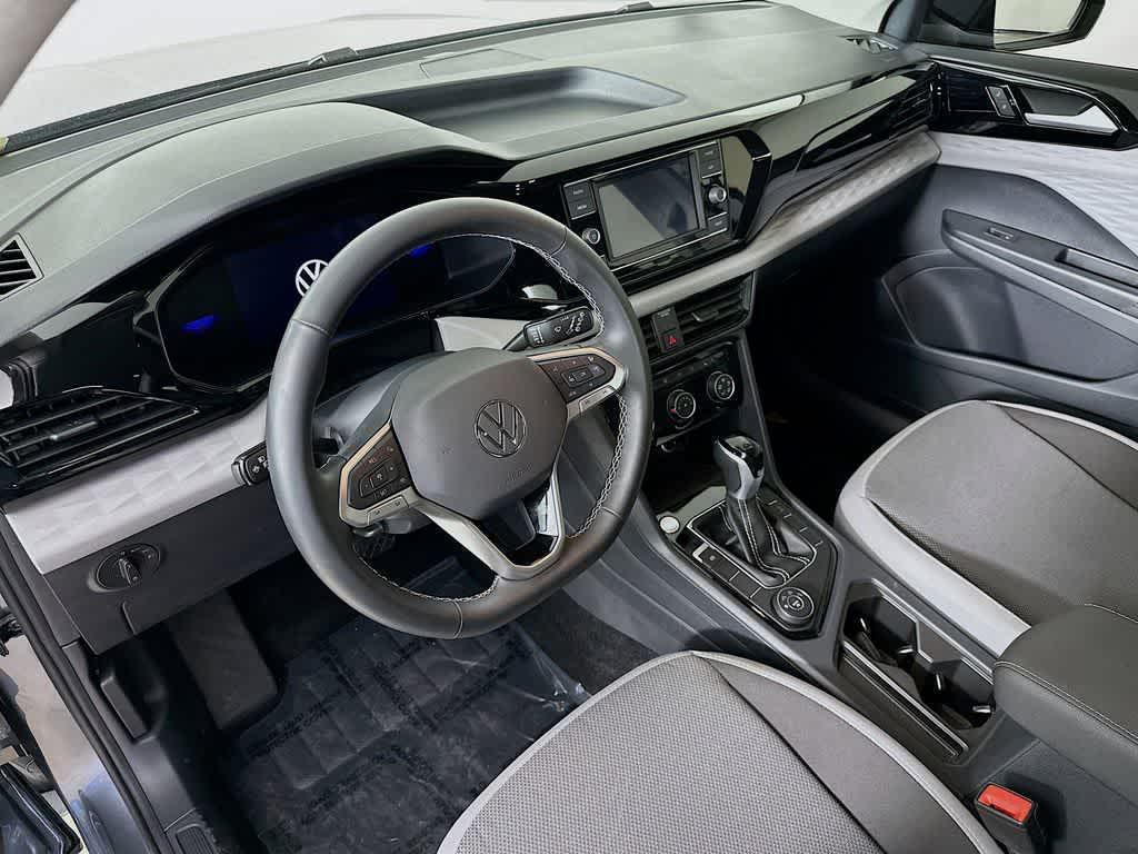 used 2024 Volkswagen Taos car, priced at $18,136