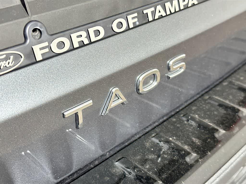 used 2024 Volkswagen Taos car, priced at $18,136