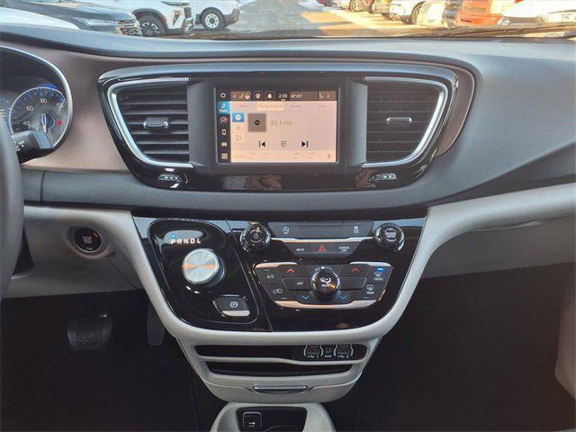 used 2024 Chrysler Voyager car, priced at $27,911