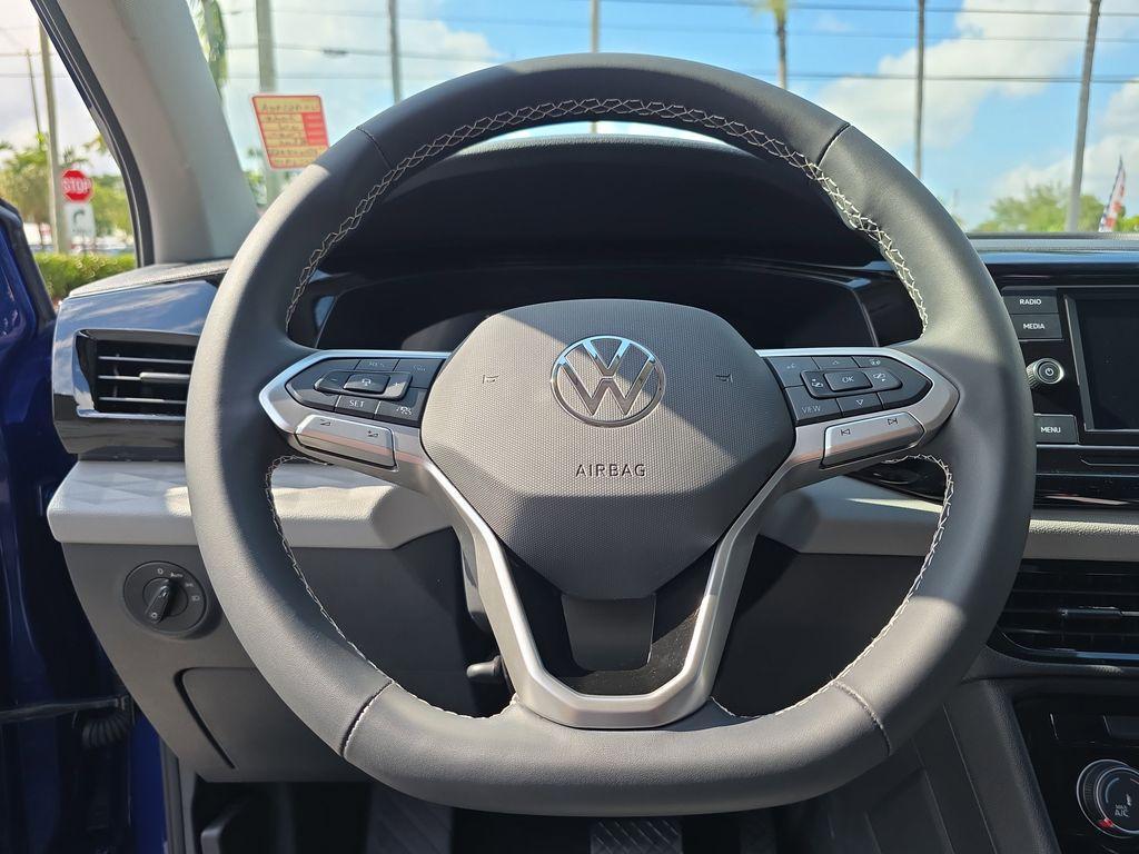 used 2024 Volkswagen Taos car, priced at $18,995