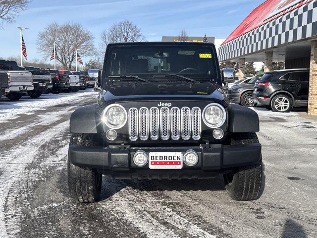 used 2014 Jeep Wrangler car, priced at $13,988