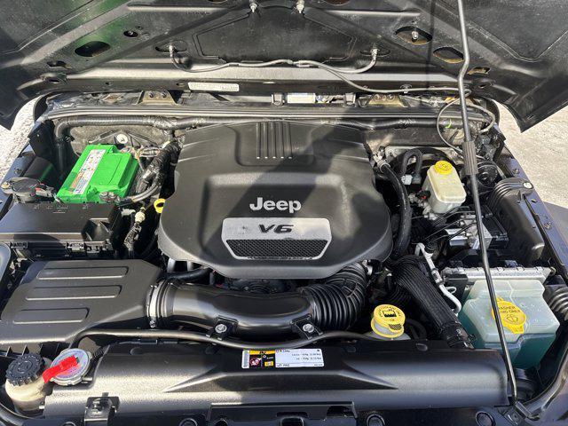 used 2014 Jeep Wrangler car, priced at $13,988