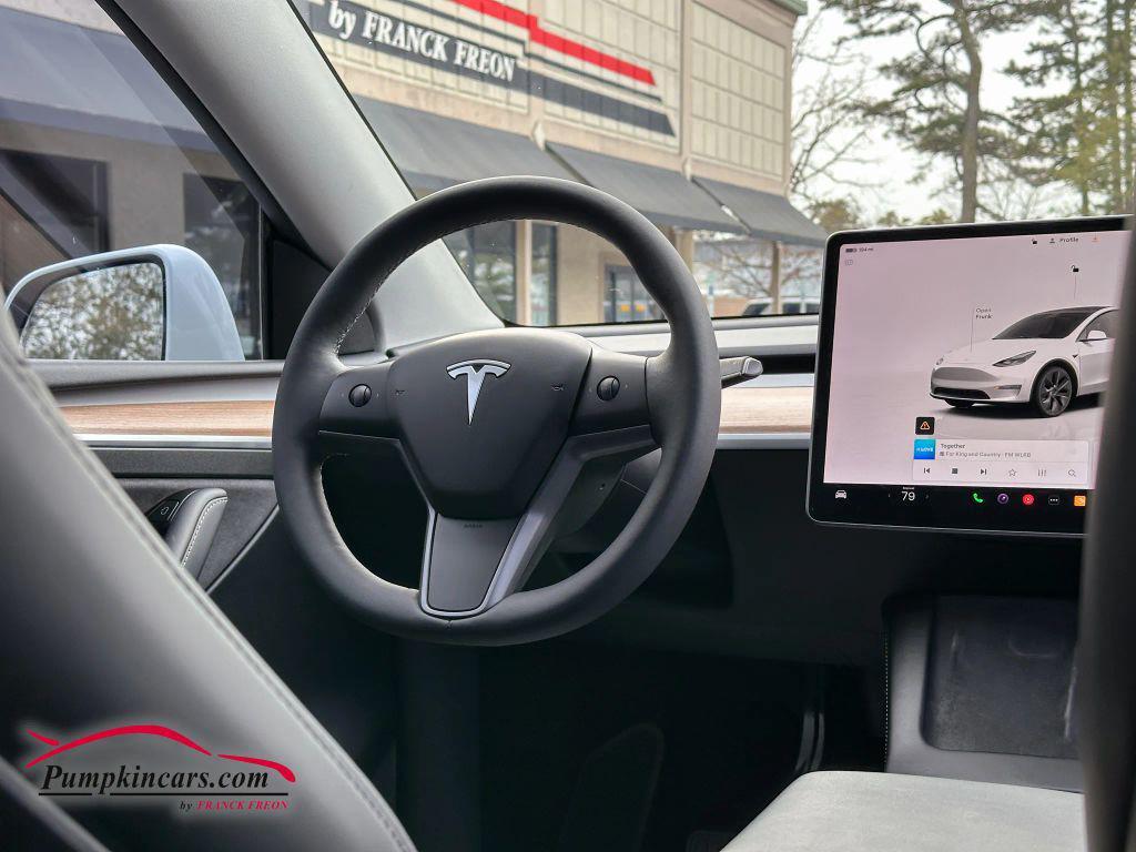 used 2024 Tesla Model Y car, priced at $36,995