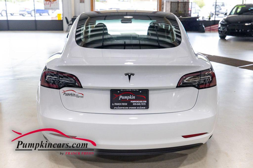 used 2023 Tesla Model 3 car, priced at $26,495