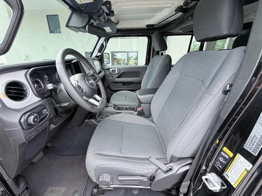 used 2025 Jeep Wrangler car, priced at $33,700