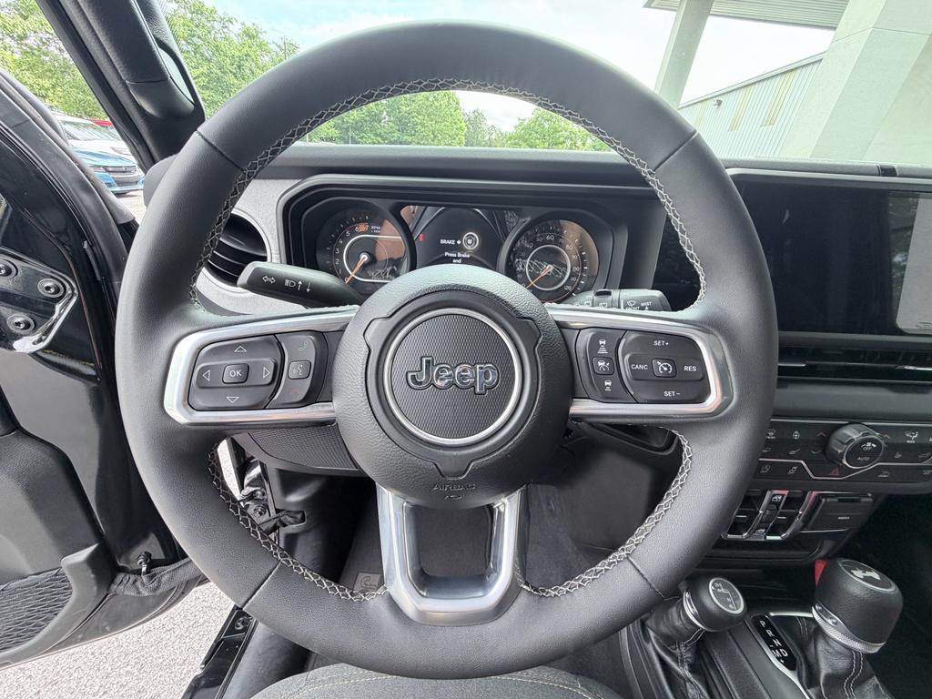 used 2025 Jeep Wrangler car, priced at $33,700