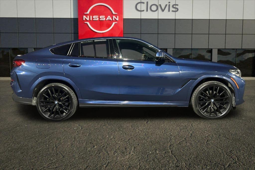 used 2023 BMW X6 car, priced at $49,421