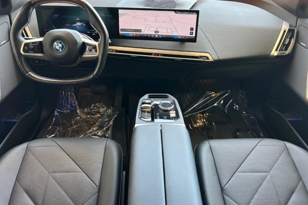 used 2025 BMW iX car, priced at $62,033
