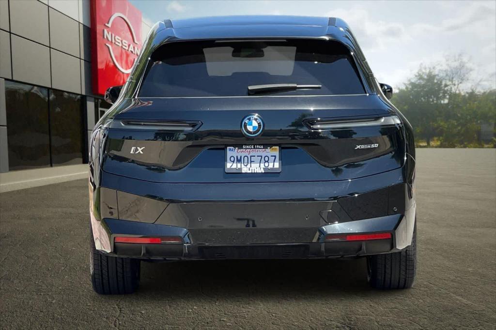 used 2025 BMW iX car, priced at $62,033