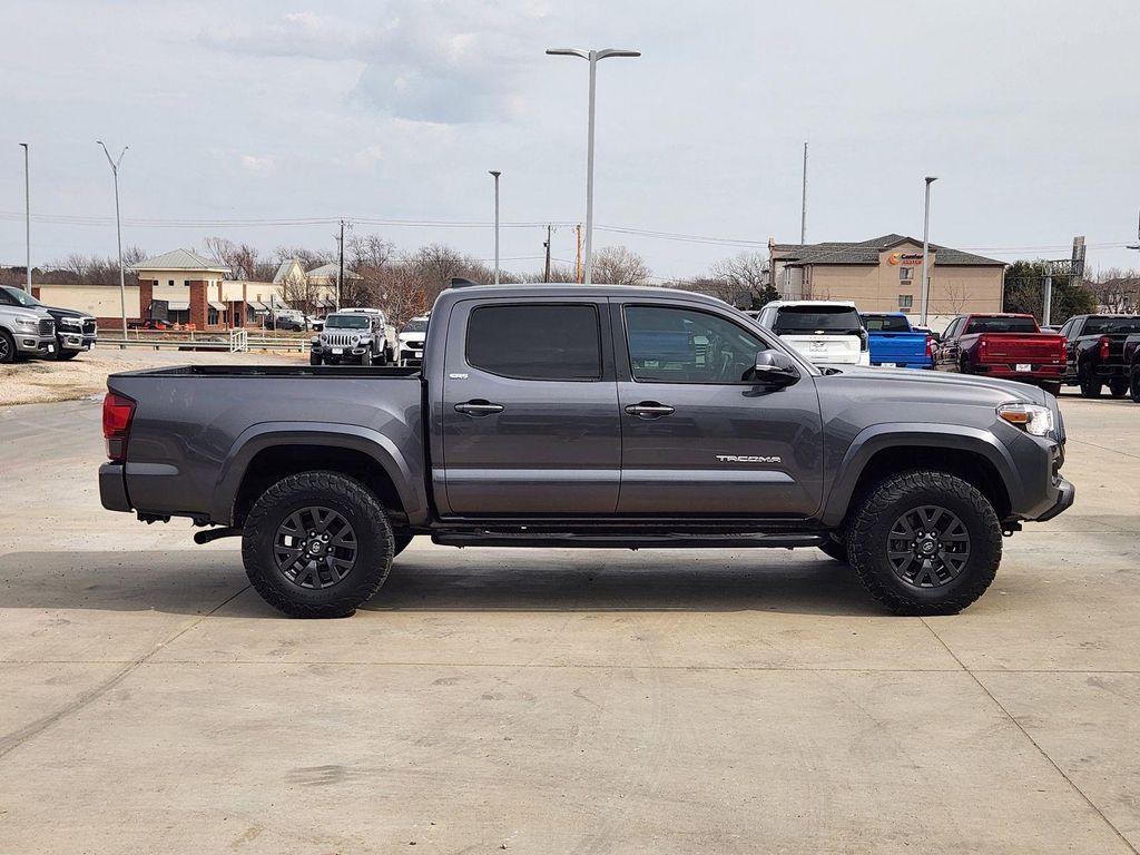 used 2021 Toyota Tacoma car, priced at $29,698