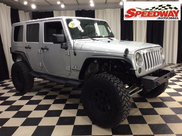 used 2010 Jeep Wrangler Unlimited car, priced at $12,999