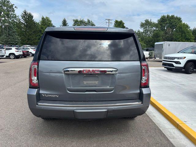 used 2019 GMC Yukon car, priced at $32,590