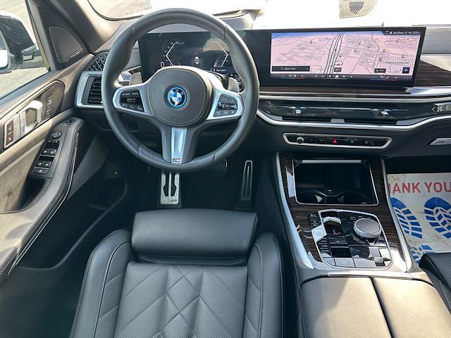 used 2024 BMW X5 PHEV car, priced at $63,900