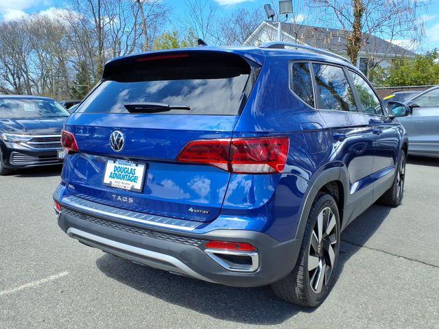 used 2023 Volkswagen Taos car, priced at $27,368