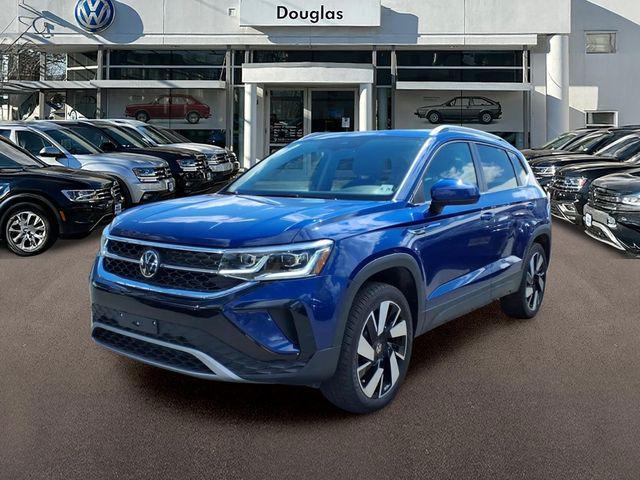 used 2023 Volkswagen Taos car, priced at $27,368