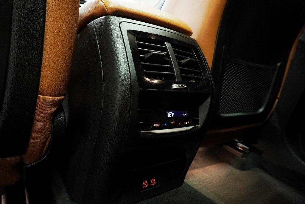 used 2023 BMW X4 car, priced at $38,993