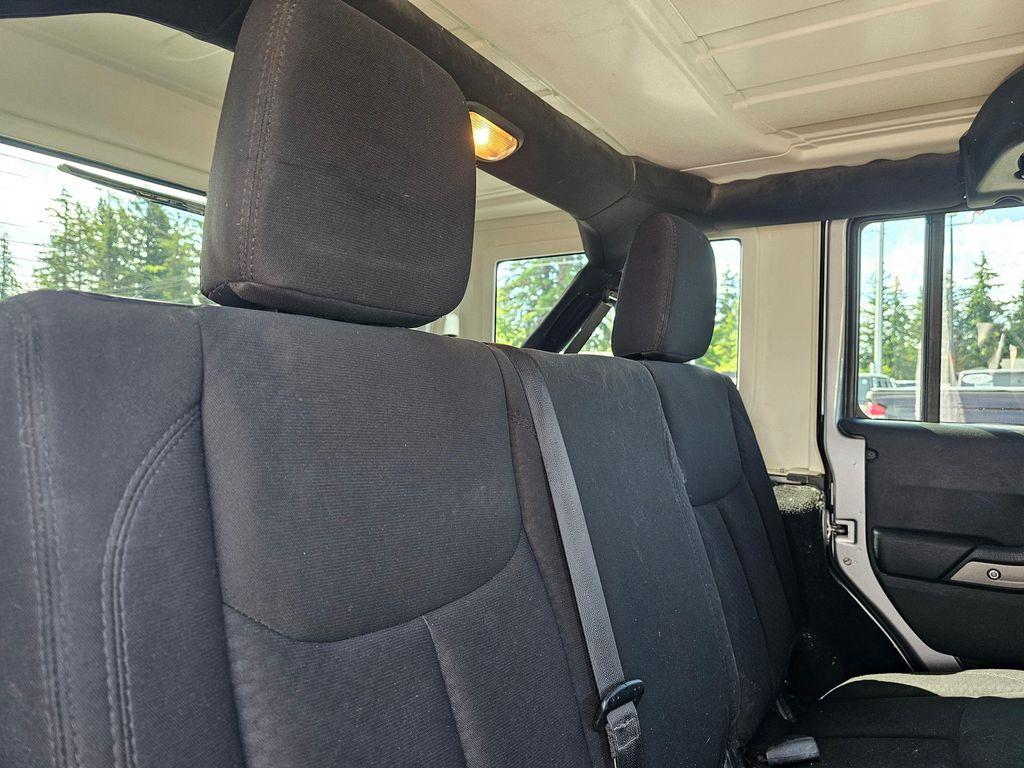 used 2014 Jeep Wrangler Unlimited car, priced at $15,850