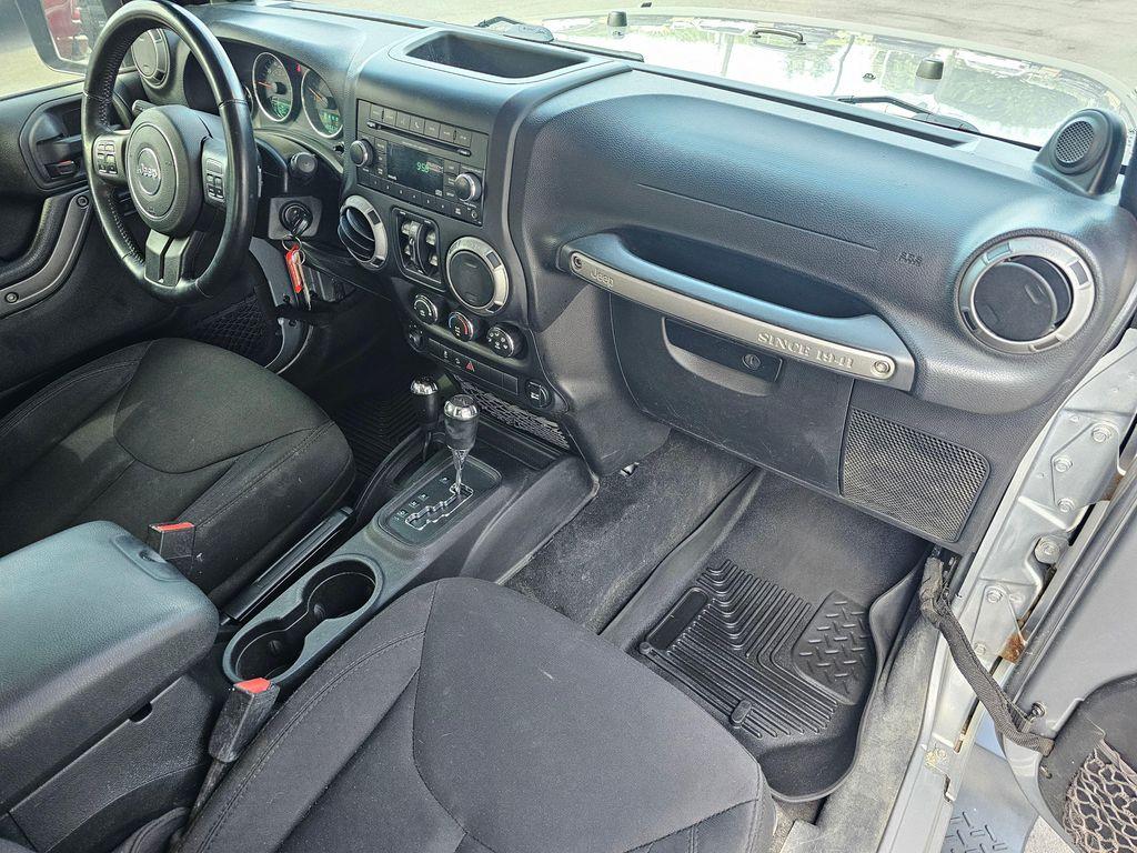 used 2014 Jeep Wrangler Unlimited car, priced at $15,850