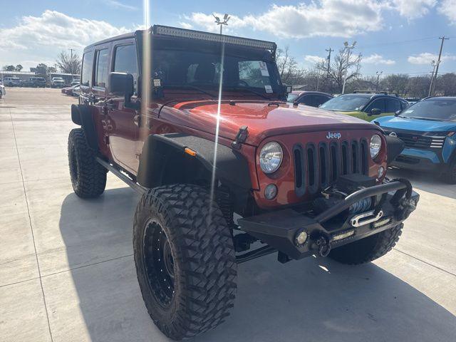 used 2014 Jeep Wrangler Unlimited car, priced at $21,699