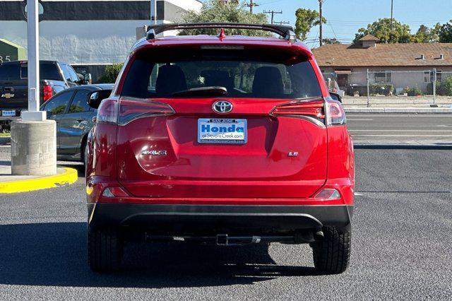 used 2016 Toyota RAV4 car, priced at $16,084