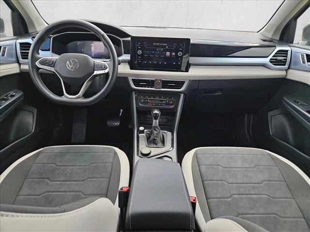 used 2025 Volkswagen Taos car, priced at $22,988