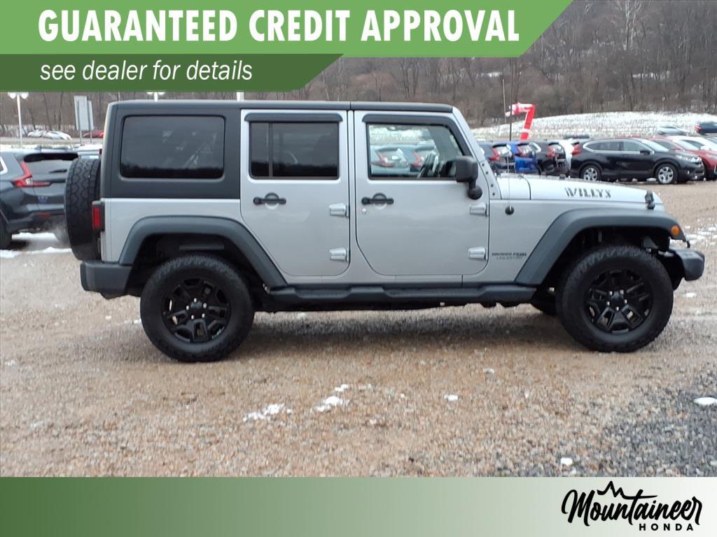 used 2018 Jeep Wrangler JK Unlimited car, priced at $17,500