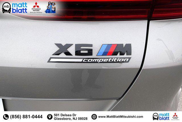 used 2022 BMW X6 M car, priced at $79,999