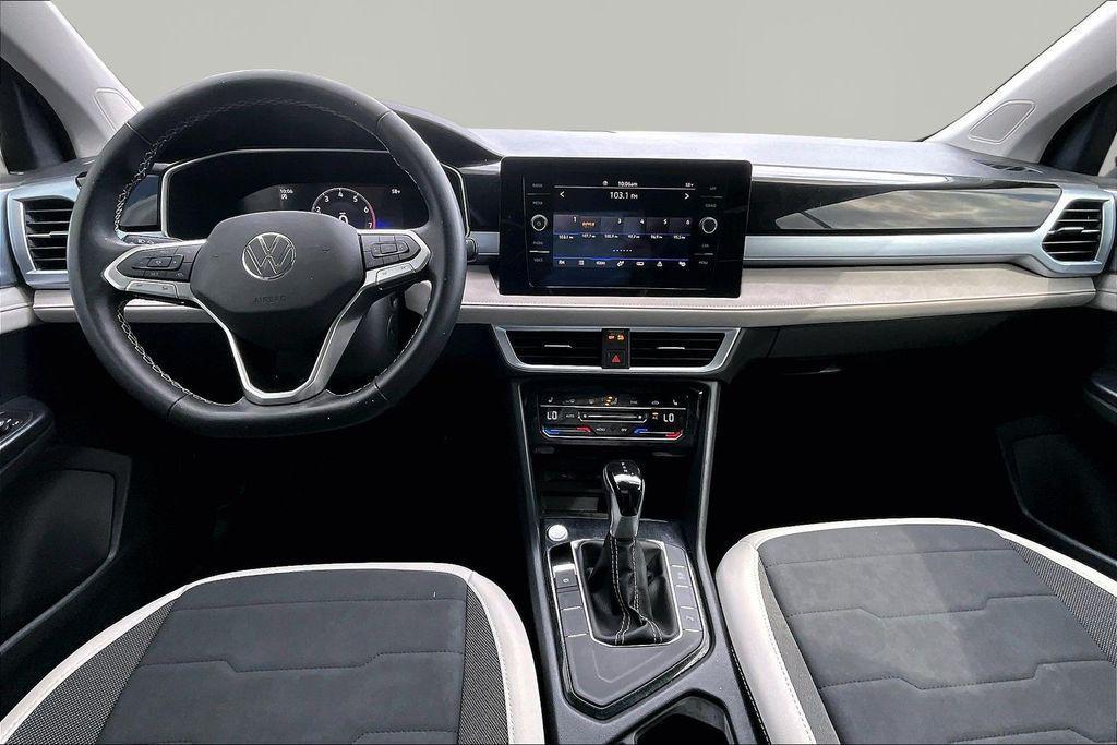 used 2025 Volkswagen Taos car, priced at $24,876