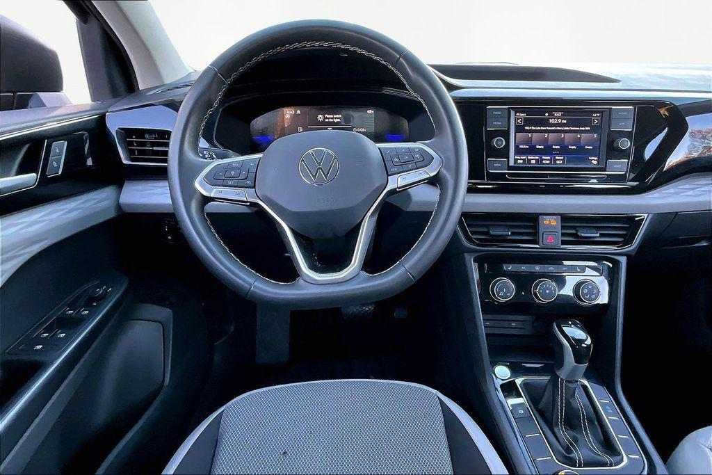 used 2023 Volkswagen Taos car, priced at $18,621