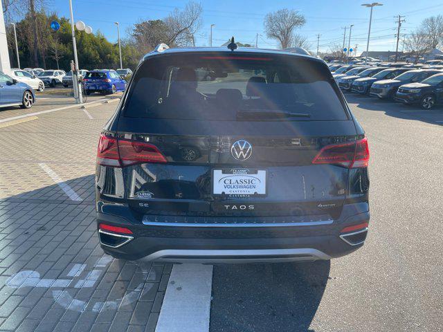 used 2024 Volkswagen Taos car, priced at $23,039