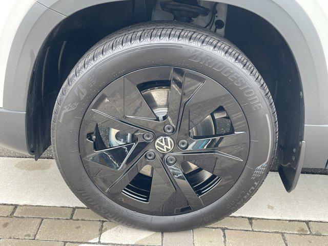 used 2025 Volkswagen Taos car, priced at $23,894