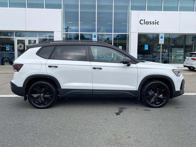 used 2025 Volkswagen Taos car, priced at $23,894