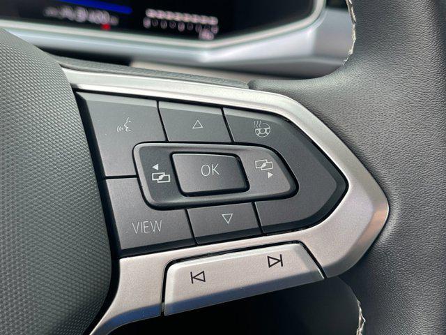 used 2025 Volkswagen Taos car, priced at $23,410