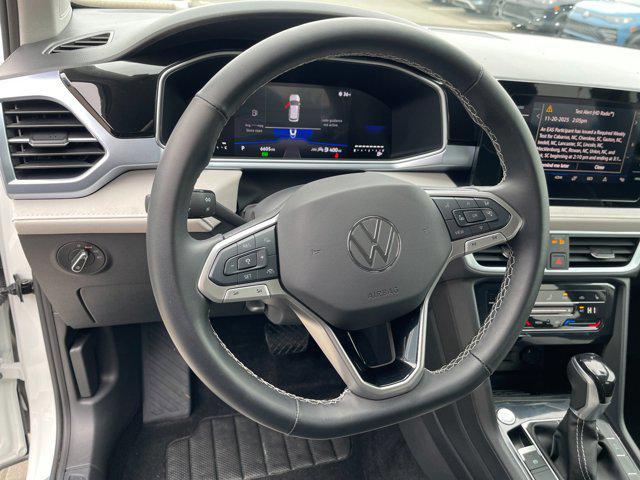 used 2025 Volkswagen Taos car, priced at $23,410
