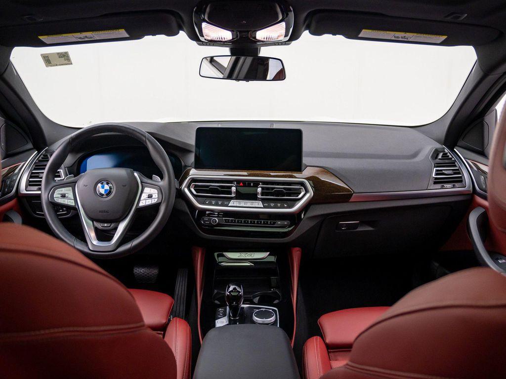 used 2025 BMW X4 car, priced at $49,035